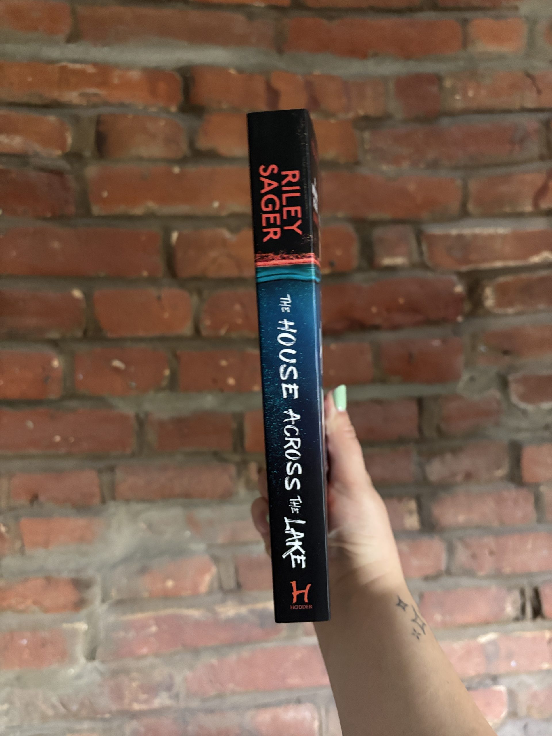 The House Across The Lake - Riley Sagar book spine
