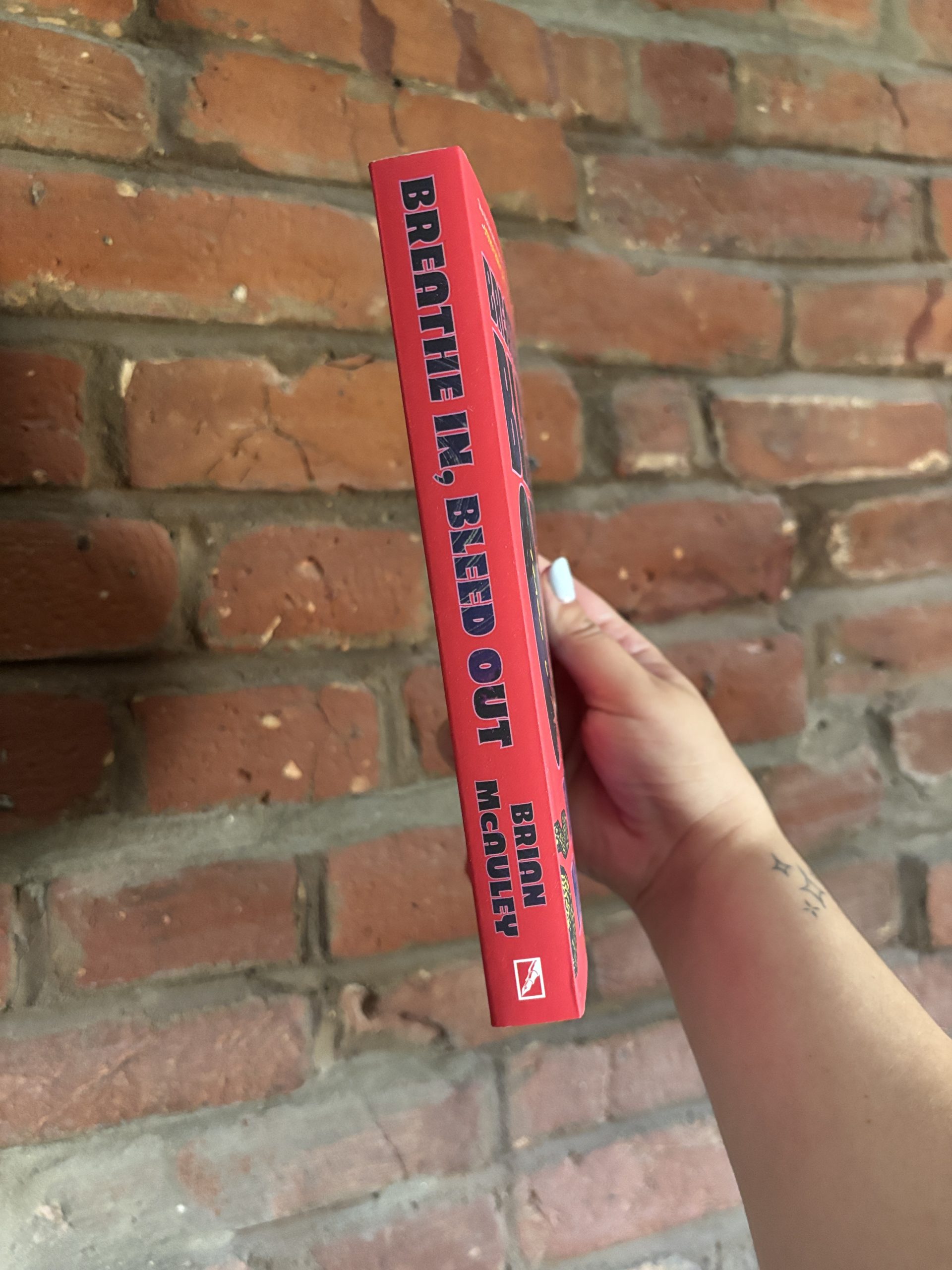 Breathe In, Bleed Out Brian McAuley book spine
