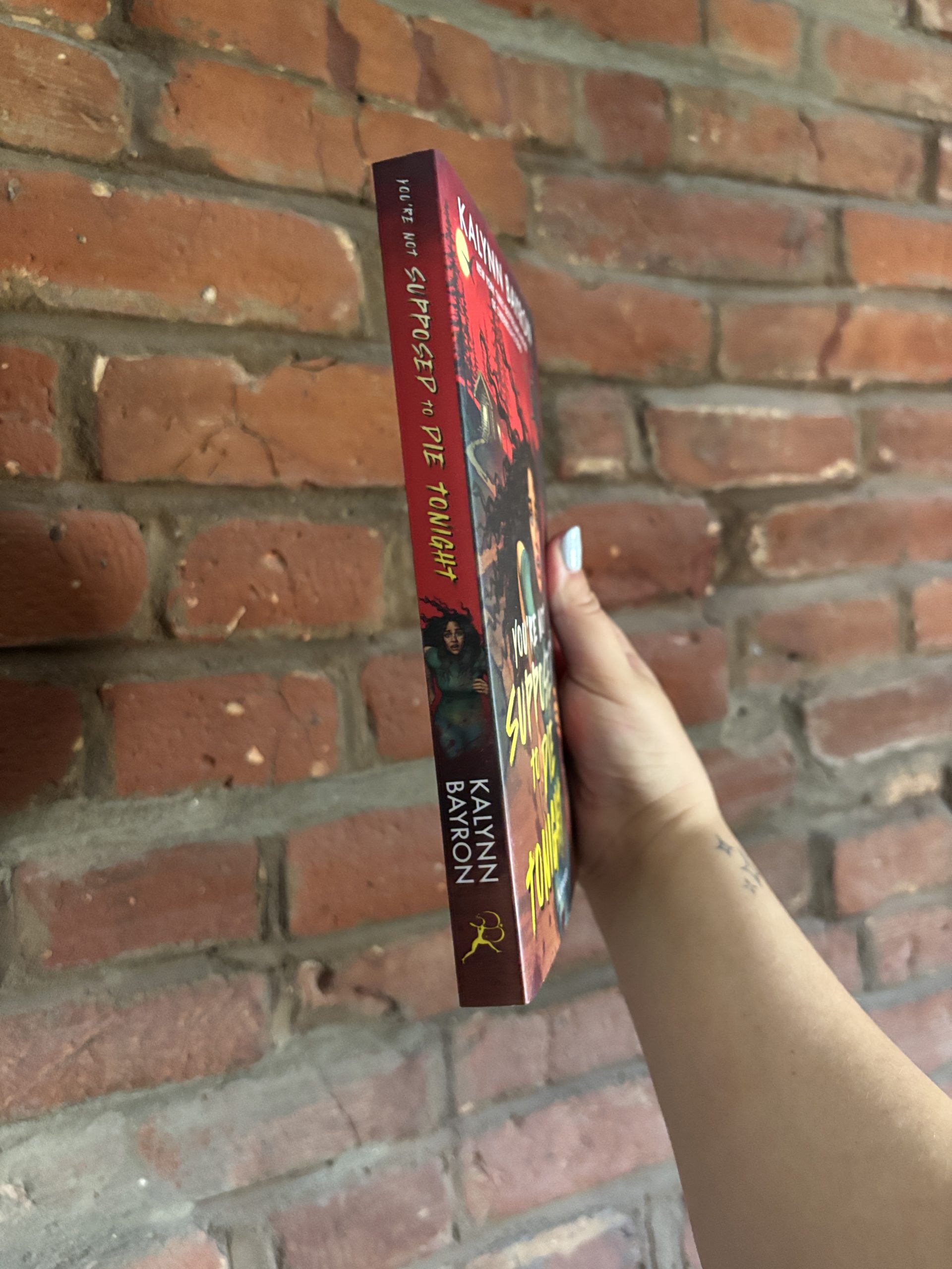 You're Not Supposed To Die Tonight Kalynn Bayron book spine