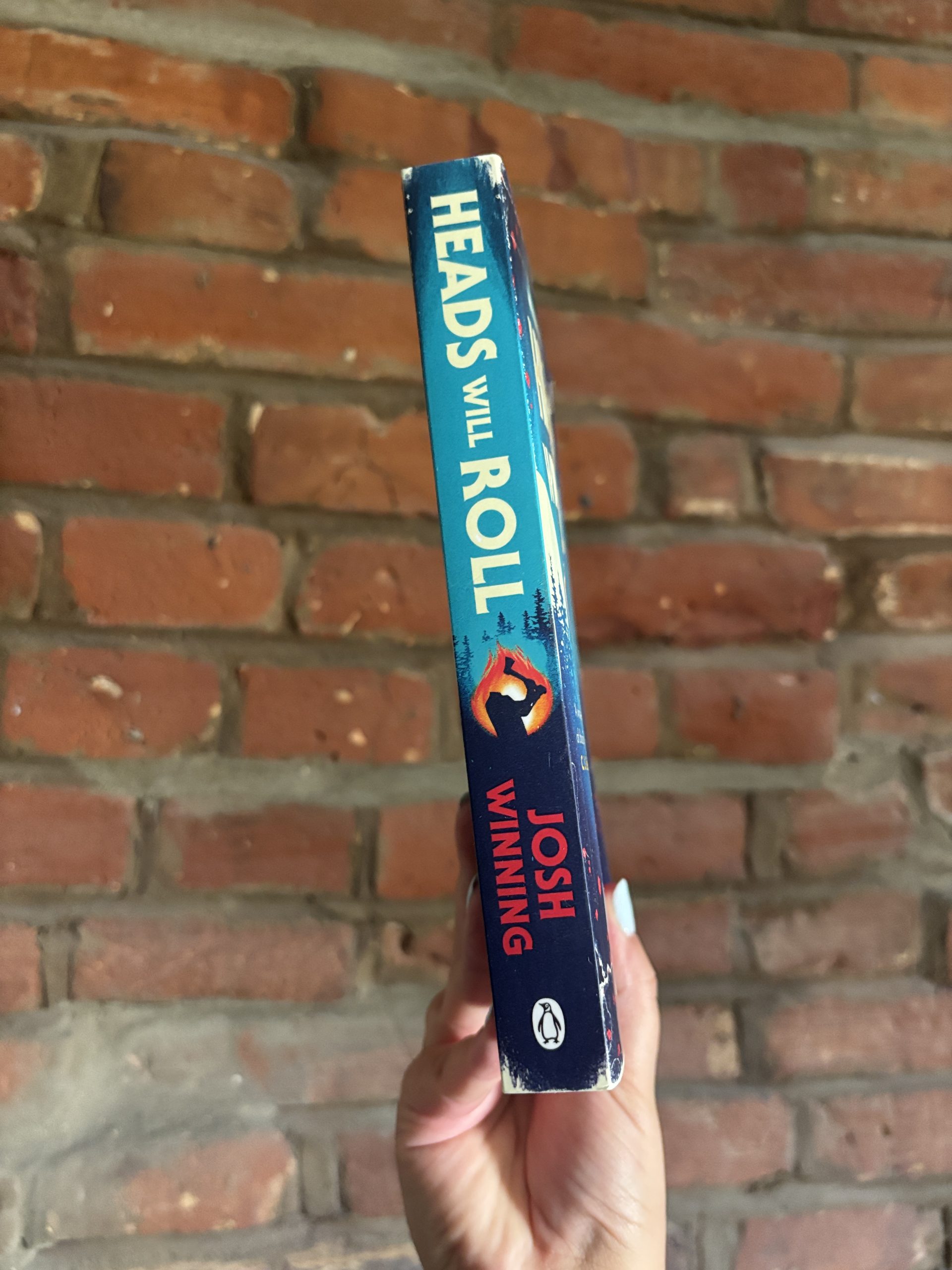 Heads Will Roll Josh Winning book spine