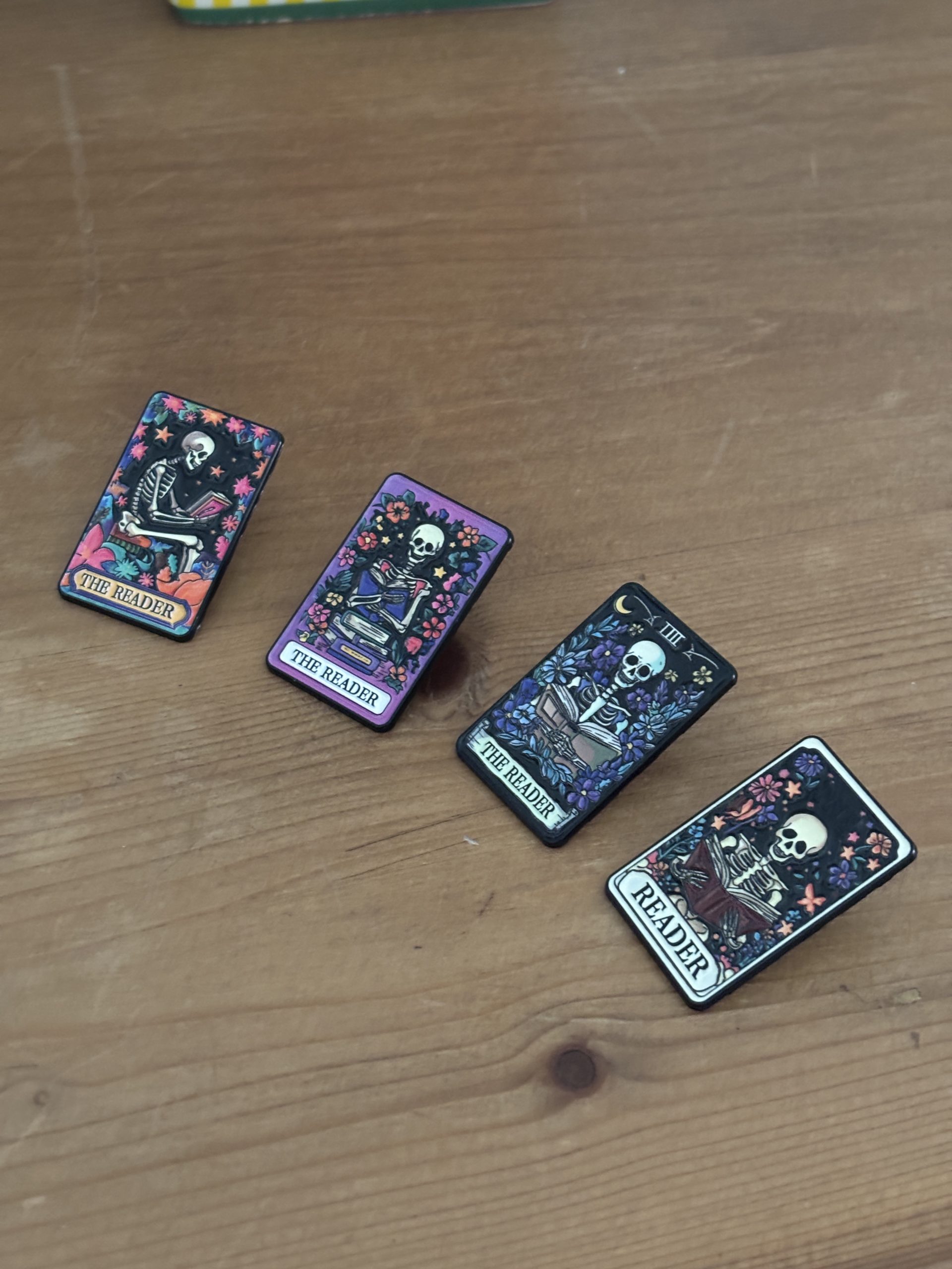 The Reader Skeleton Tarot Enamel Pins collection