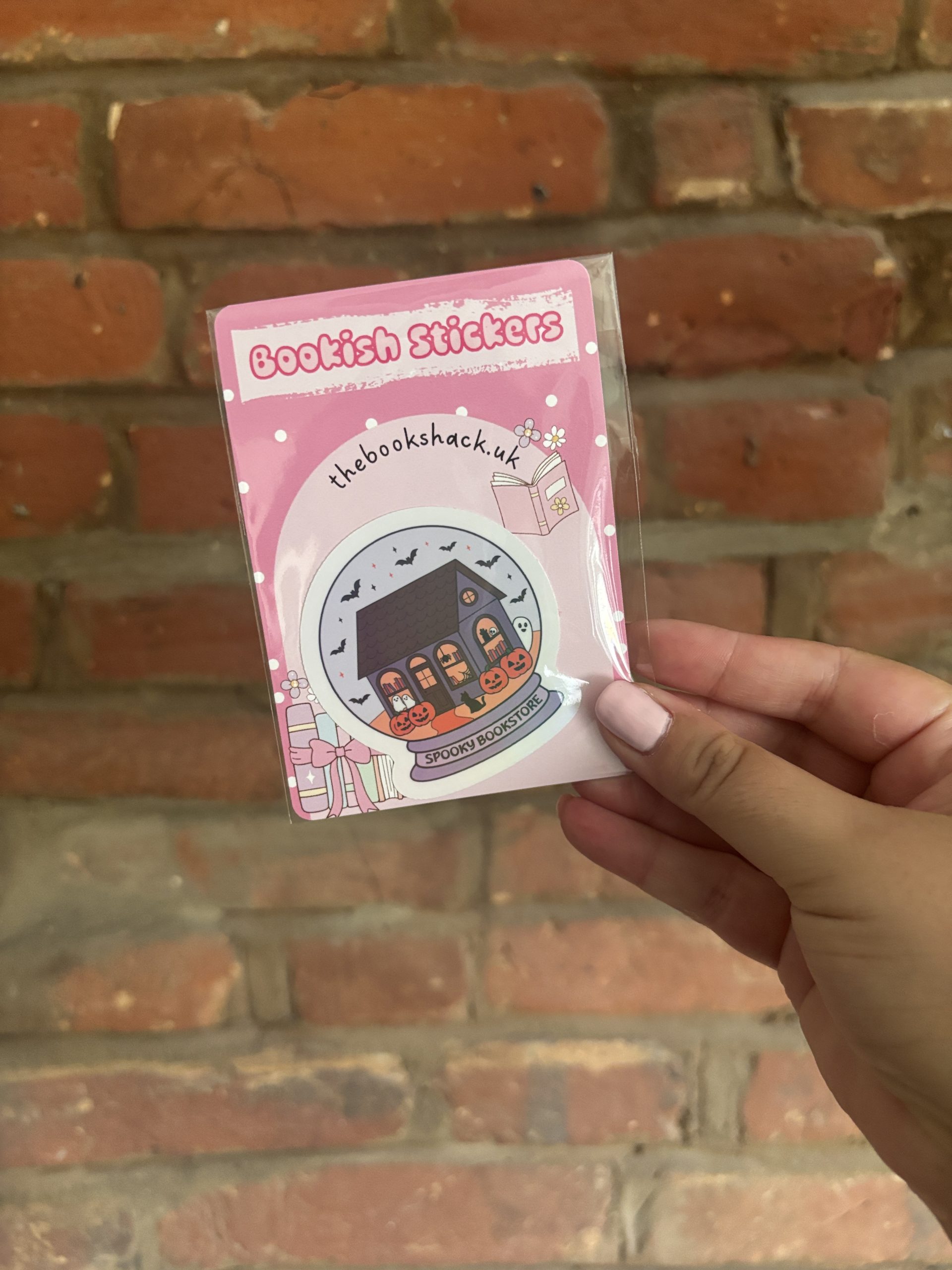 Spooky Bookstore Holographic Globe sticker front