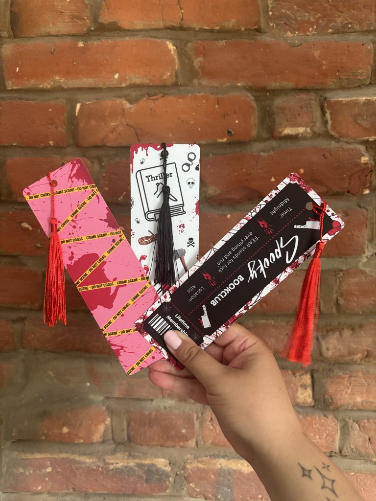 Three bookish bookmarks featuring horror, crime and thriller themed designs by The Book Shack.
