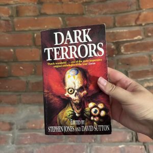 Dark Terrors: The Gollancz Book of Horror Volume 1 by Stephen Jones and David Sutton, horror anthology book with illustrated cover