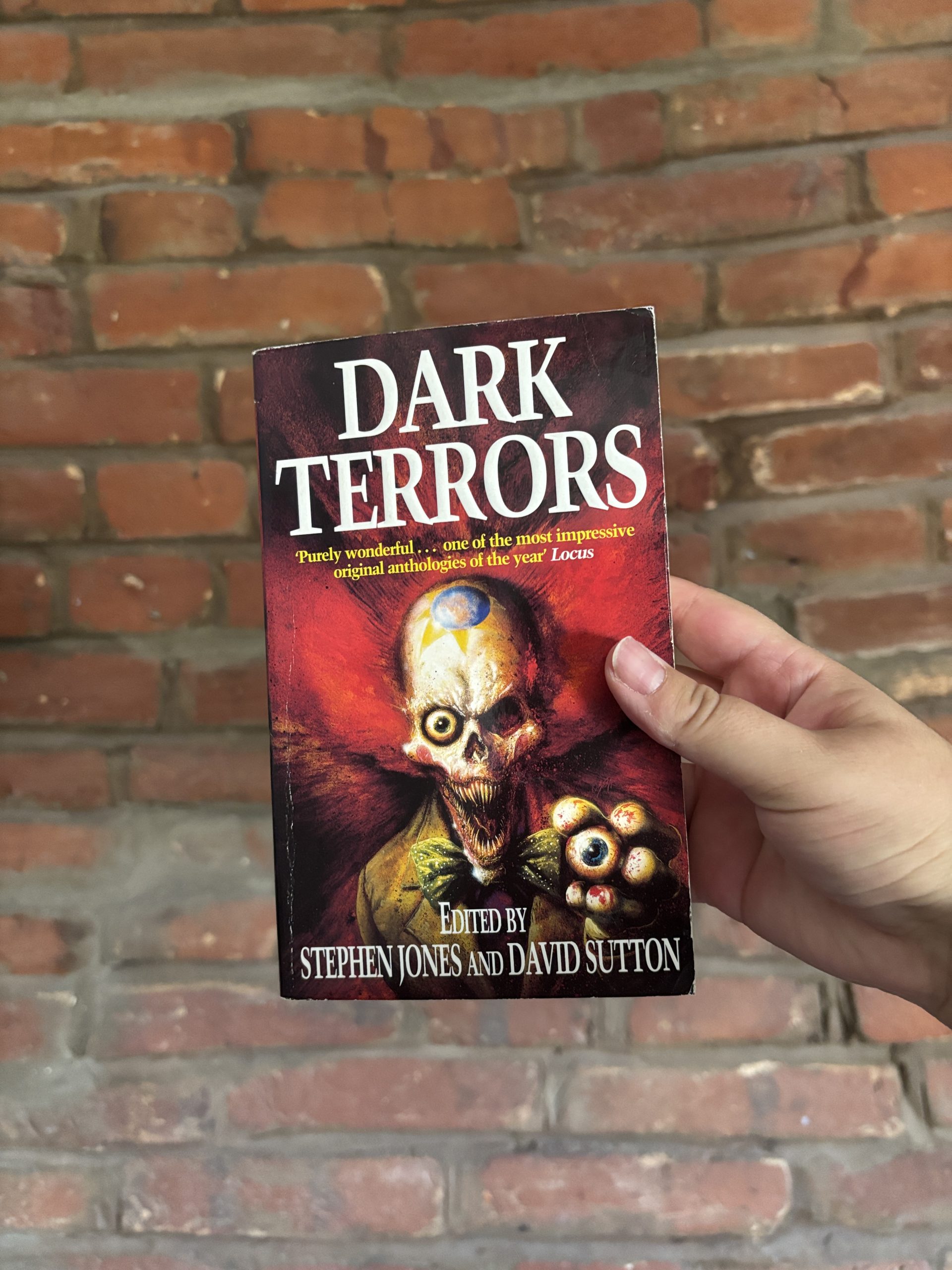Dark Terrors: The Gollancz Book of Horror Volume 1 by Stephen Jones and David Sutton, horror anthology book with illustrated cover