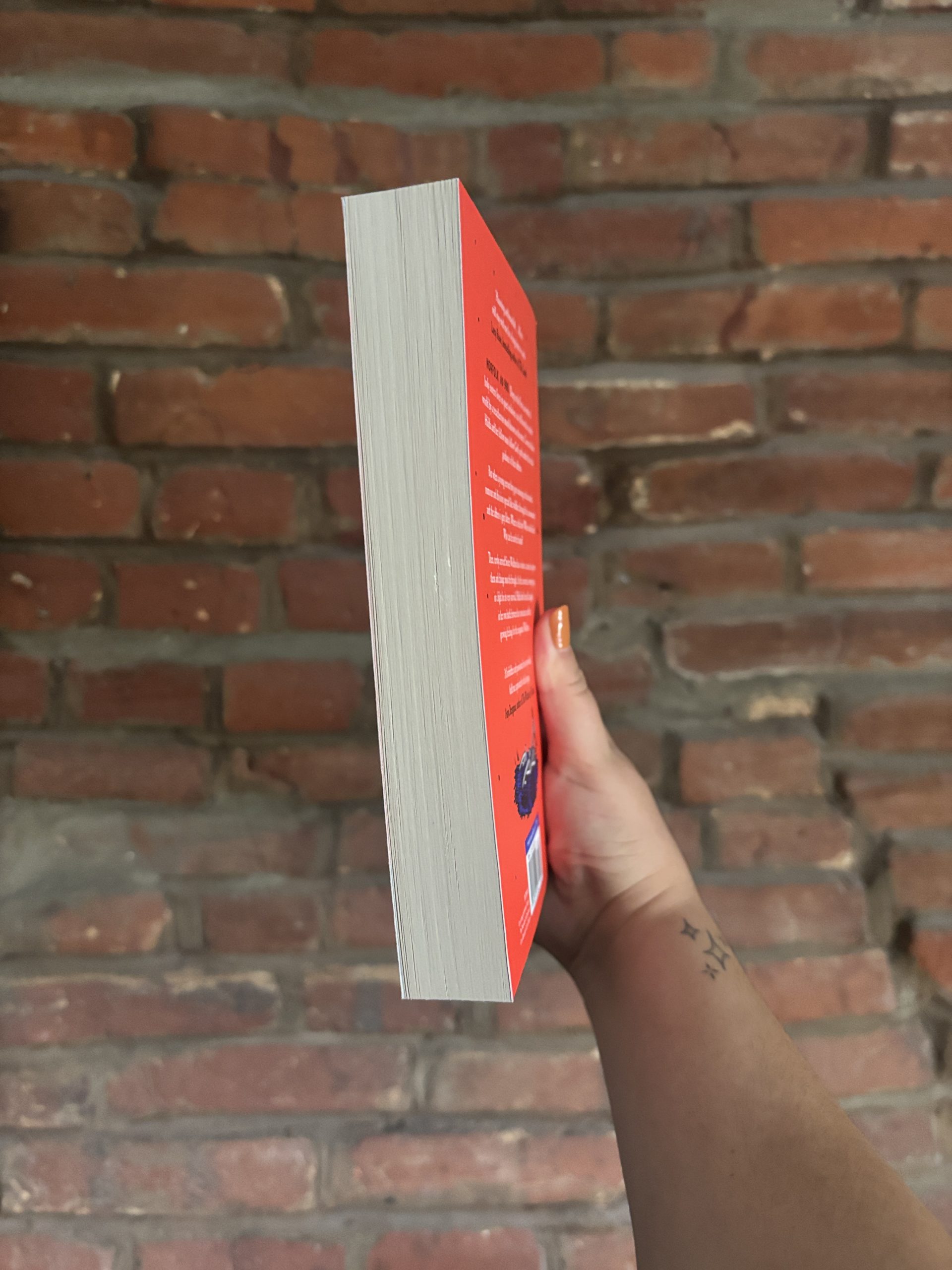 Angled view of Mere by Danielle Giles, showing the book edge