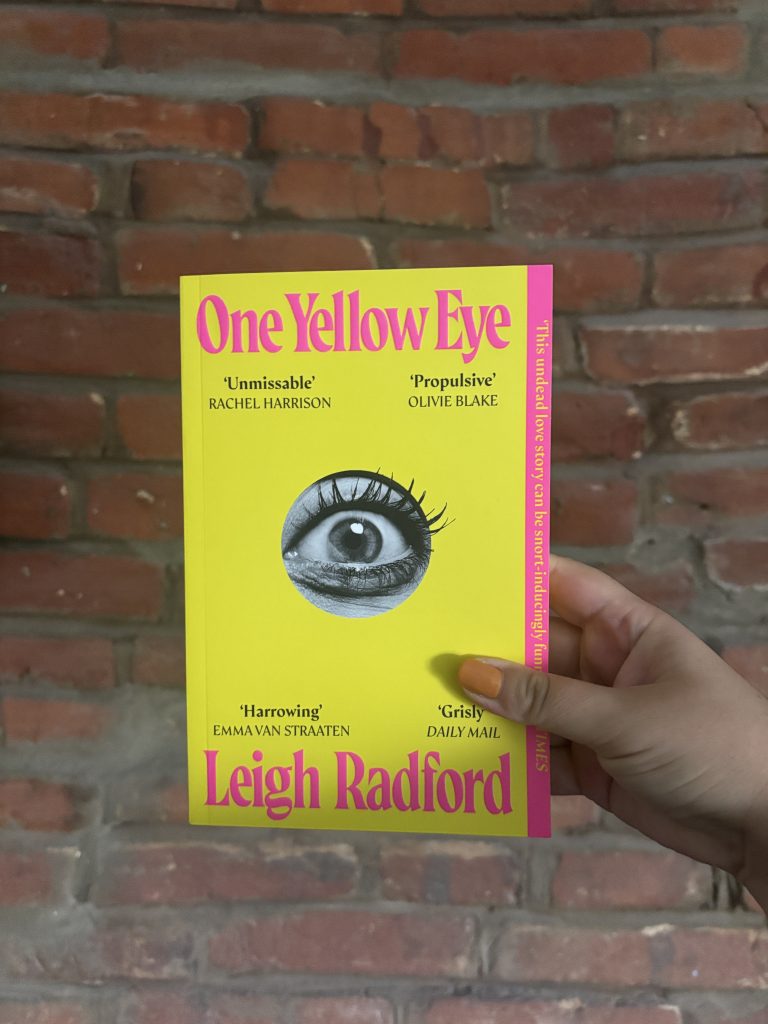Front cover of One Yellow Eye by Leigh Radford, a darkly funny zombie horror novel.